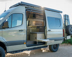 Burley Van Co Alta rear bumper detail with spare tyre mount and storage rack